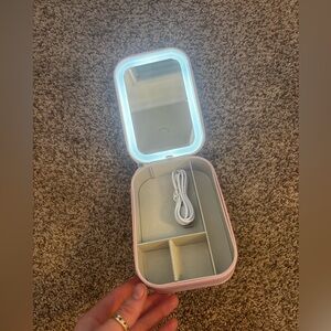Portable Pink Makeup Mirror and jewelry organizer with LED Light